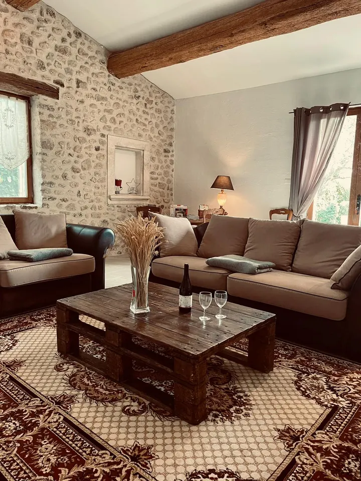 Living room with stone walls